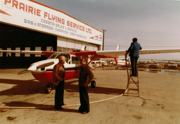 L–R: John How with brother Tom, in front of a Cessna Skymaster (Photo Courtesy John L. Howe)